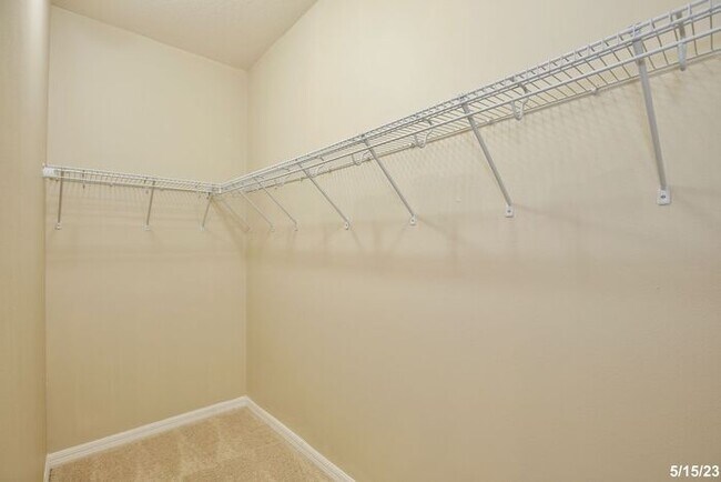 Building Photo - Gorgeous 4/3.5 Home with a Large Fenced Ba...