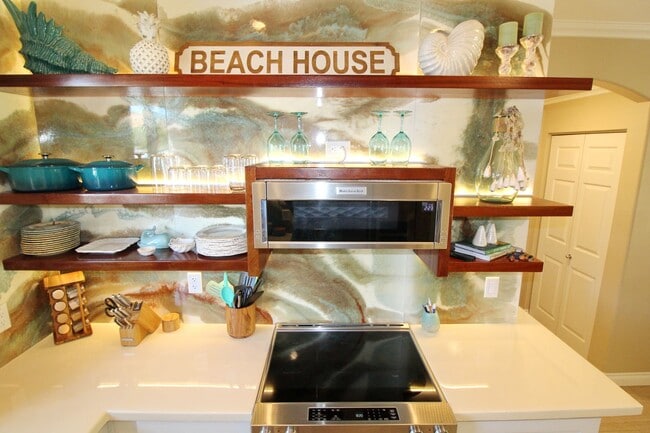 Building Photo - Beach Style 2 bed/2bath Luxury Condo - Finely Furnished - Steps from the Beach - Resort Amenities -