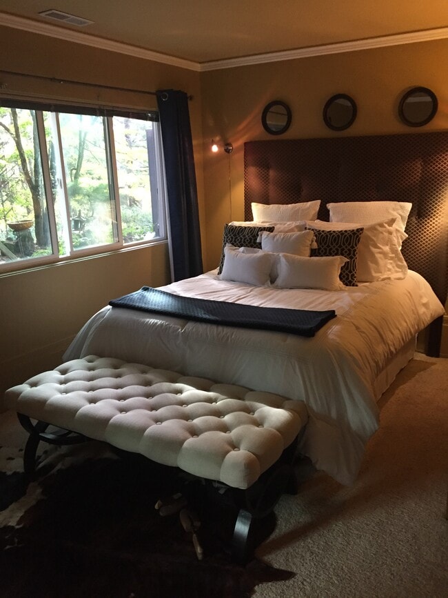 Bedroom with window onto private yard. - 3140 SW Westwood Dr