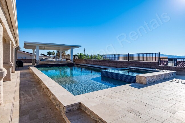 Building Photo - FURNISHED POOL HOME WITH LAKE VIEW