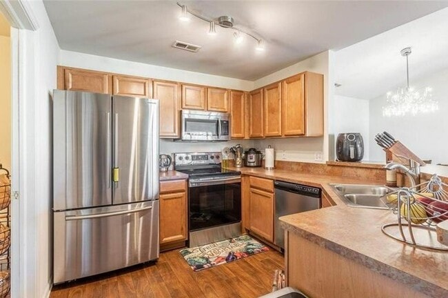 Building Photo - GORGEOUS COMMERCE TOWNSHIP 2 BED/2 BATH MO...