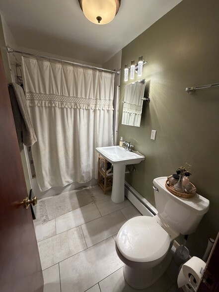 Brand new tile and paint - 2113 N Sherman Ave