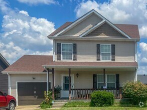 Building Photo - Single-Family with a Fenced Backyard!