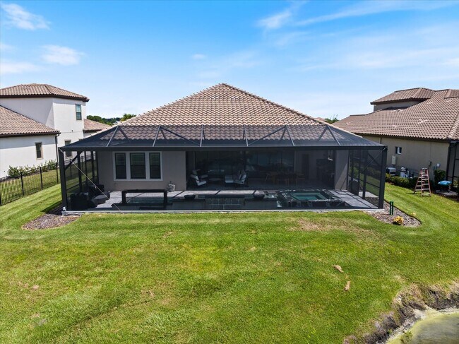 Building Photo - Luxury Home w/ Pool, Outdoor Kitchen, Car Lift, & Water View In Parrish!