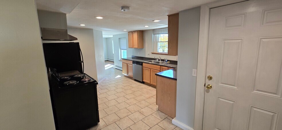 Kitchen looking toward living room - 103 S Main St