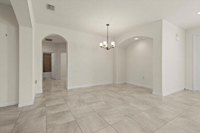 Building Photo - 12133 SW Aventino Dr