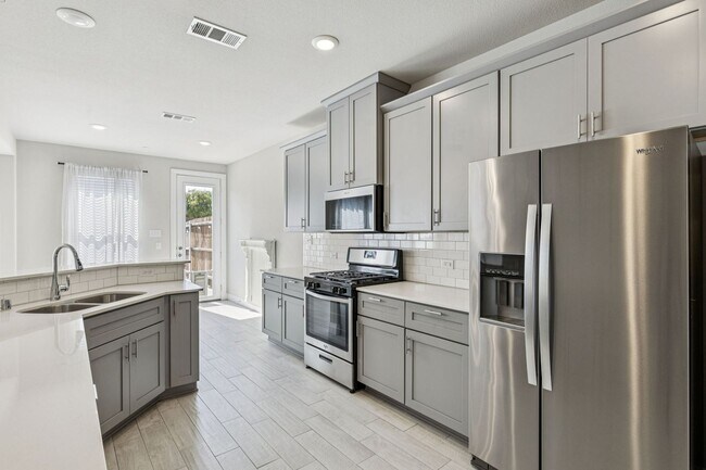 Building Photo - Discover Elevated Living at Normandy Village
