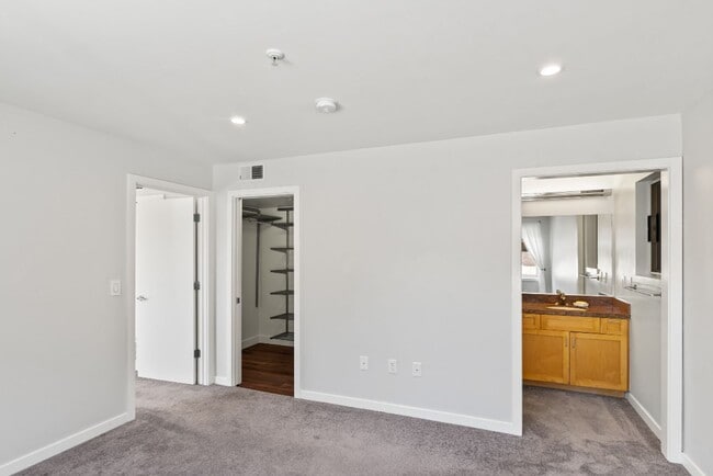 Building Photo - Well maintained two-story condo - Bright End Unit - Lease Terms Options Outlined in Description