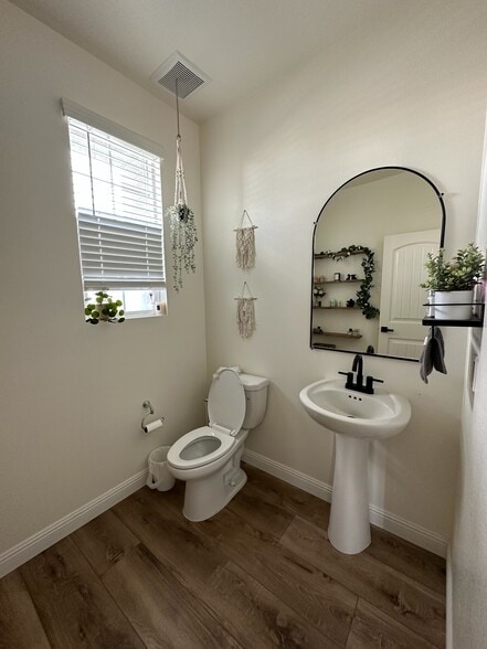 Downstairs half bath - 30321 Town Square Dr