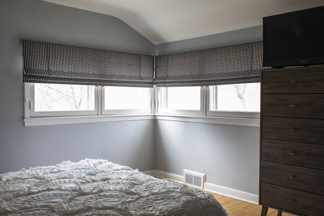 Spacious master bedroom with lots of light and large closet with new organization system built in. - 4242 N Olsen Ave