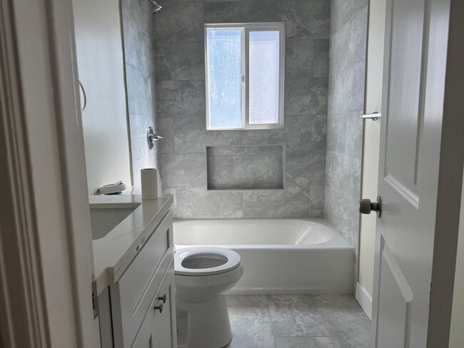 Building Photo - FOR RENT — COMPLETELY REMODELED Apartment