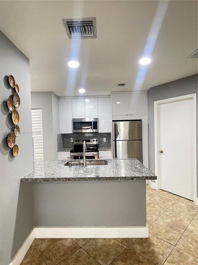 Building Photo - 18310 NW 68th Ave
