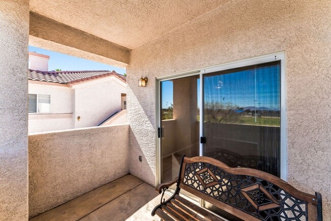 Building Photo - Bright & Stylish Condo with Fireplace and Private Balcony in a Resort-Style Community!