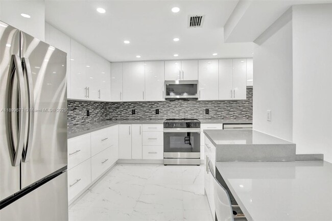 Building Photo - 9801 Collins Ave