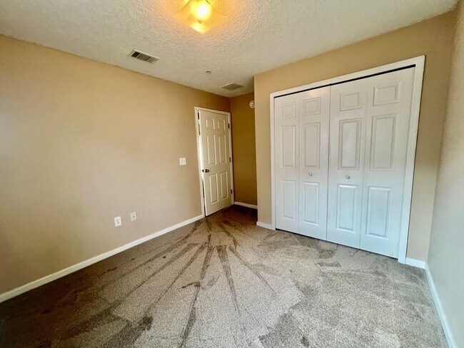 Building Photo - Gated Comfort Condo, Poolside Vibes: Your Next Home Awaits at Merrill Pines