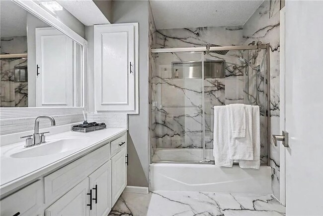 Building Photo - Newly Updated 3 Bed/2 Bath Duplex in Blue Valley with Fenced Yard, Large Deck & Attached 2-Car Ga...