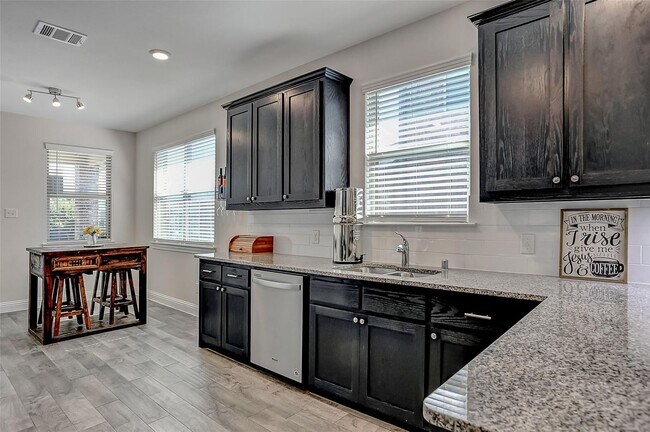 Building Photo - 3 Bed rooms and 2 baths, large master closet. Vinyl garage floor coating is just one of the many ...