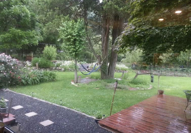 Herb garden and rock pathway - 40 Oak St