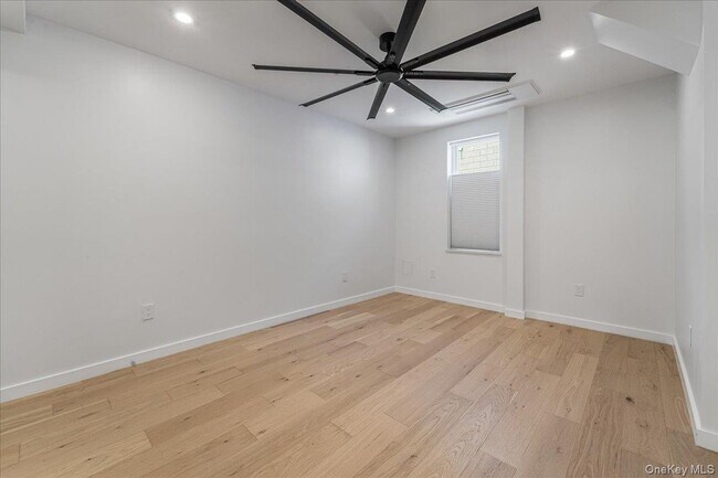 Building Photo - 36-34-36-11 11th St