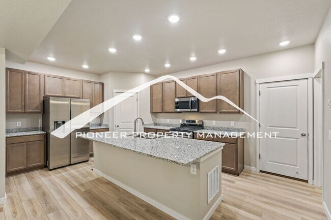 Building Photo - Spacious 4-Bedroom Home with Newly Finished Basement Near COS Airport, Fort Carson & Peterson SFB