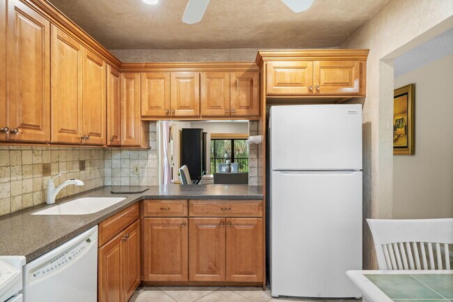 Building Photo - 21669 Tall Palm Cir