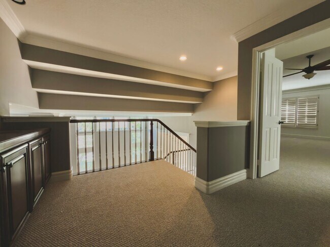 Building Photo - Elegant Mediterranean Living with Private Pergola Garden & Resort Amenities
