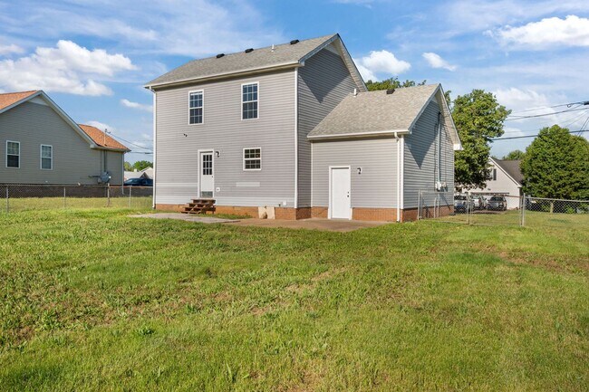 Building Photo - Charming Brick Home with Soaring Ceilings & Updated Finishes!