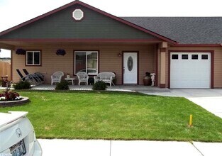 Building Photo - All Utilities and Yard Care Included in th...