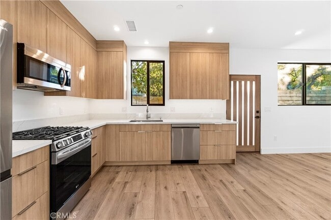 Building Photo - 7663 Maestro Ave