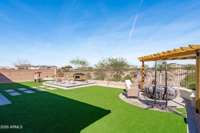 Building Photo - 10812 E Tesla Ave