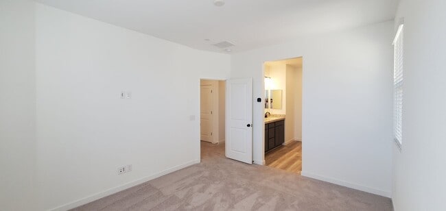 Building Photo - Beautifully designed modern townhome with attached garage.