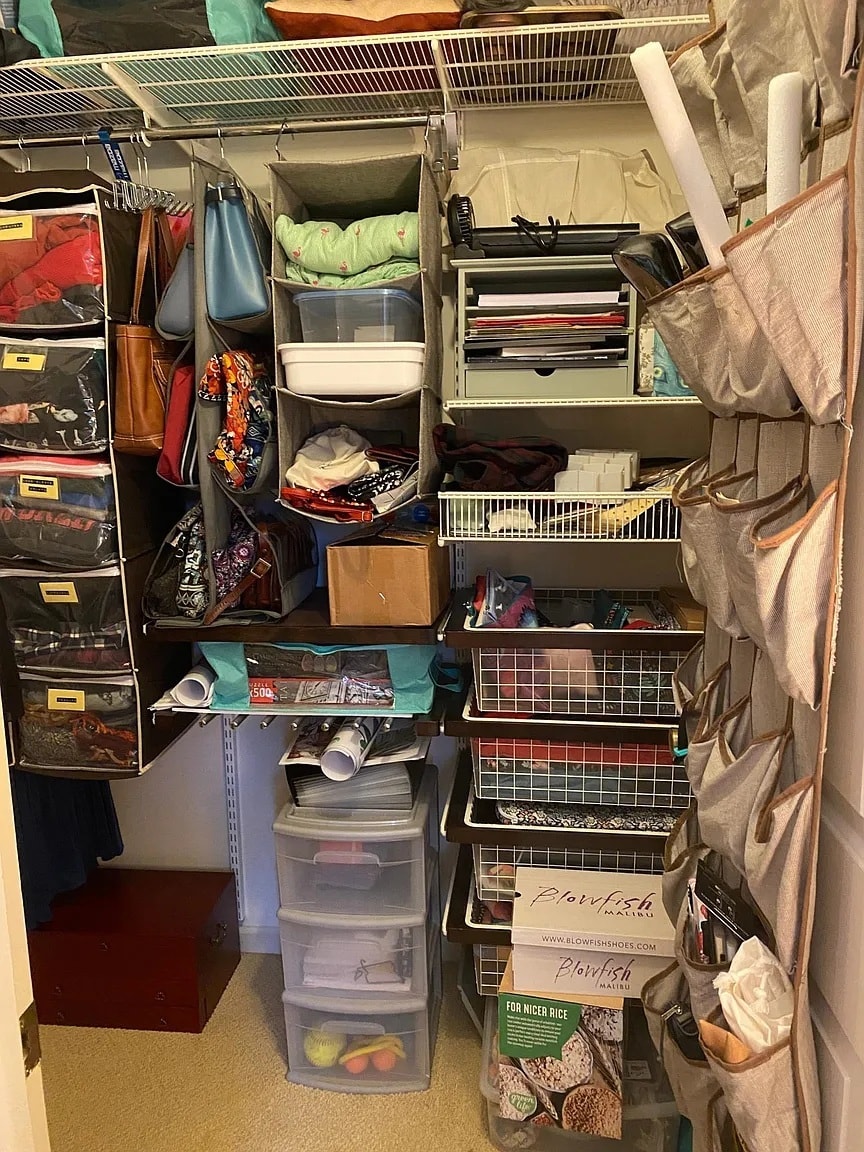 Small walk-in closet in second bedroom with built-in storage system - 1483 Keys Crossing Dr NE