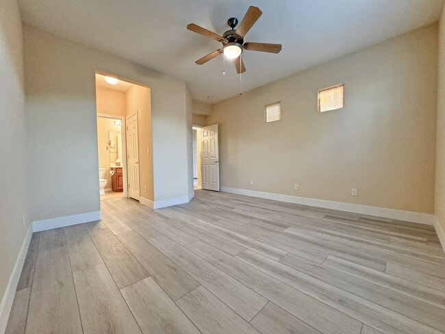 Building Photo - Vaulted Ceiling single-story home in a gat...