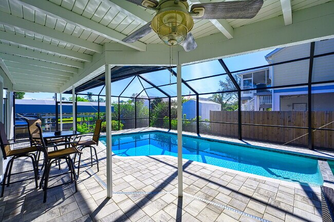 Building Photo - Waterfront Furnished Pool Home with Gulf & Canal Views in Estero Bay Shores