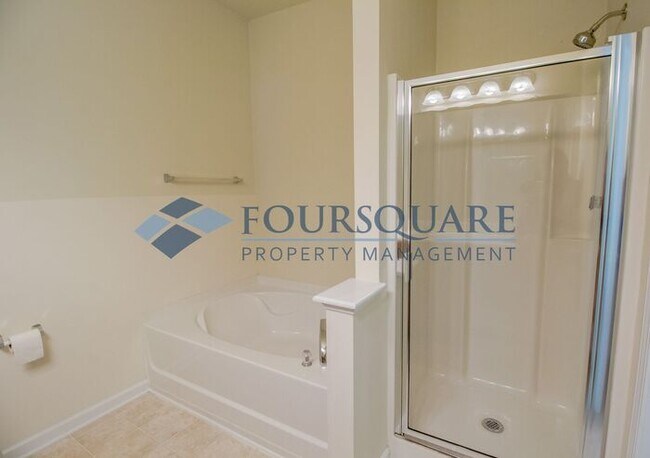 Building Photo - End Unit Townhome | Washer/ Dryer Included...