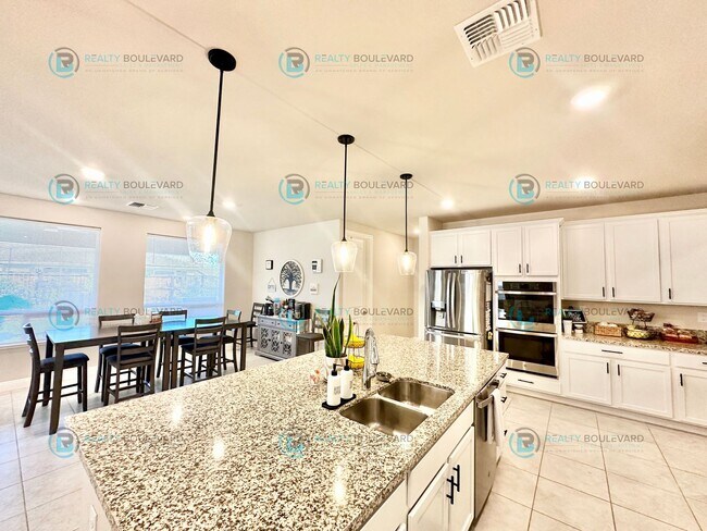 Building Photo - Welcome to your dream home, where modern elegance meets unparalleled convenience!