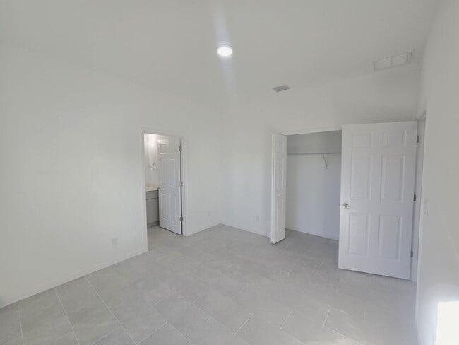 Building Photo - Brand New 2/2/1-PRIME SW LOCATION - Lehigh Acres