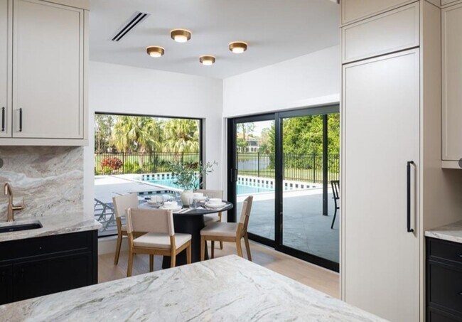 Building Photo - STUNNING REMODELED 4-BEDROOM, 3.5-BATH FUR...