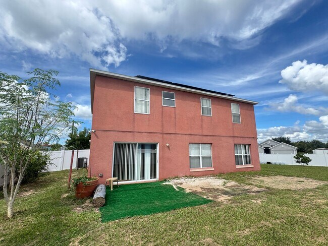 Building Photo - FULLY FENCED YARD + SOLAR PANELS + WATER F...