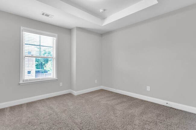 Building Photo - Stunning Executive Townhome in Gated Brook...