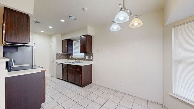 Building Photo - BRAND NEW STAINLESS STEEL APPLIANCES, ALL TILE HOME $1,295