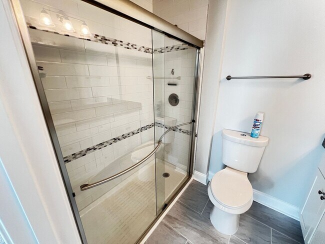 Building Photo - Available Now! - Pet Friendly 2 Bedroom, 2.5 Bath Townhome at Market Common! Cable and Internet I...