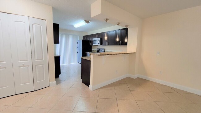 Building Photo - WINTER PARK: Goldenrod Condo - Ground Floo...