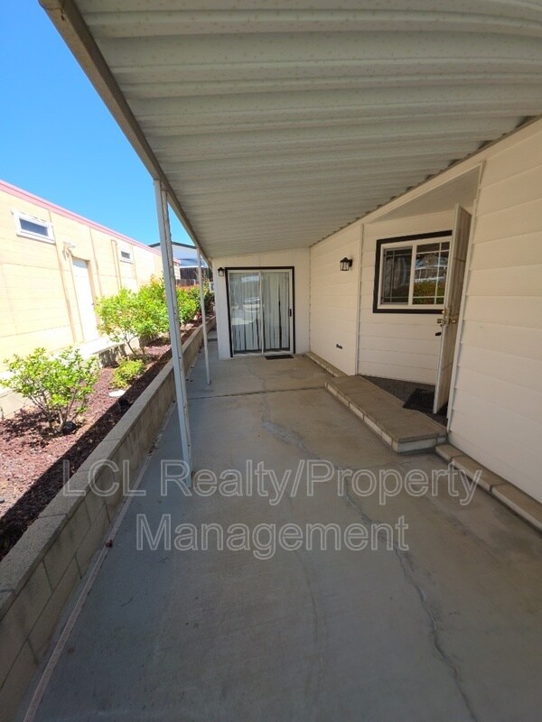 Building Photo - 30715 Arenga Palm Dr