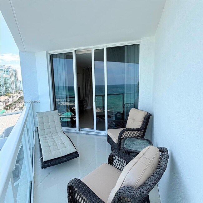 Building Photo - 16699 Collins Ave