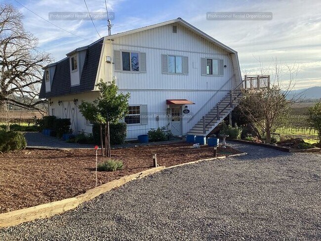 Building Photo - A price and views that can't be beat- Upper Flat with deck & expansive Vineyard and Sunset views