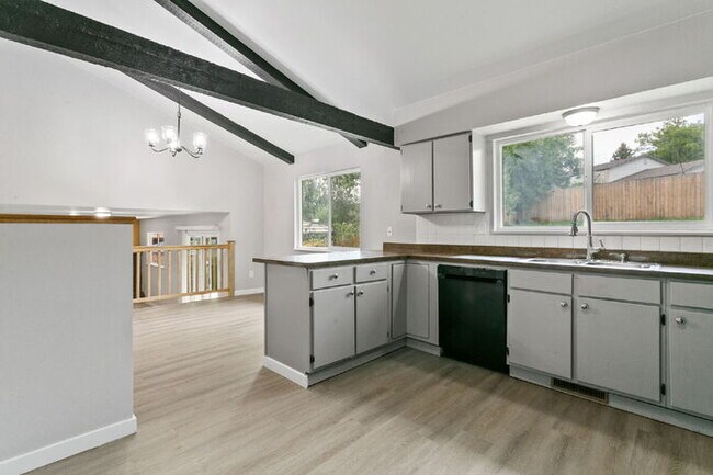 Building Photo - Freshly Renovated 4-Bedroom Home with Over...