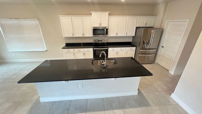 Building Photo - Beautiful Harmony Central Water Front Home AVAILABLE NOW!