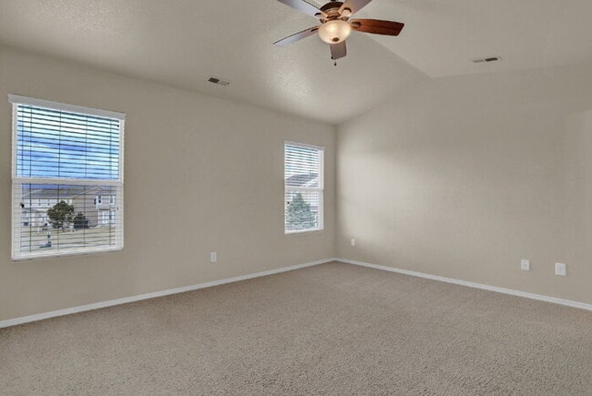 Building Photo - Spacious 3-Bed End-Unit Townhome with Mountain Views Near Ft. Carson