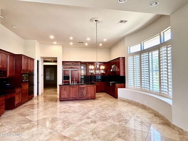 Building Photo - 7484 E Pontebella Dr